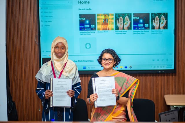 Image of signing of MOU with Asili Zanzibar